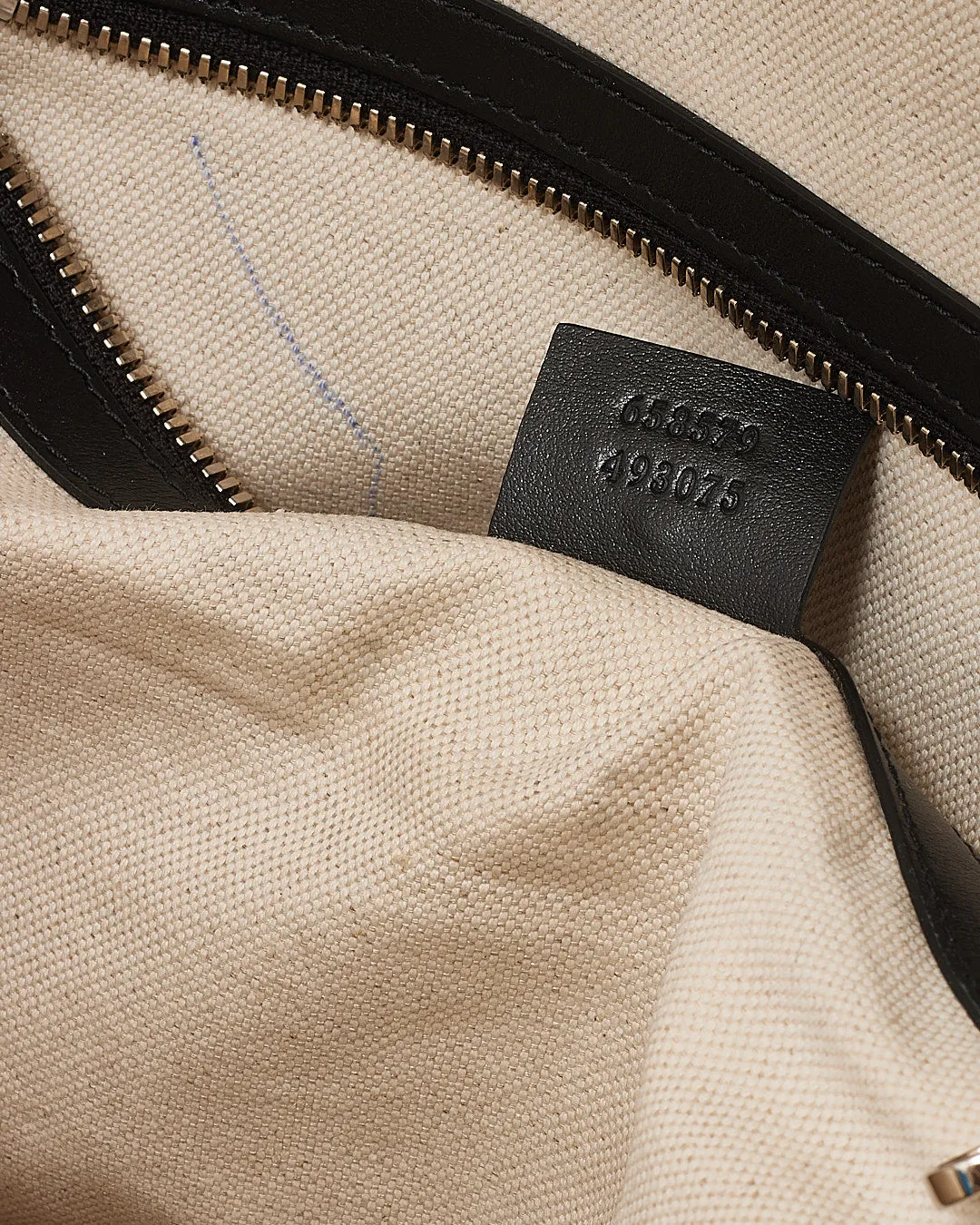 Gucci Black GG Perforated Leather Backpack