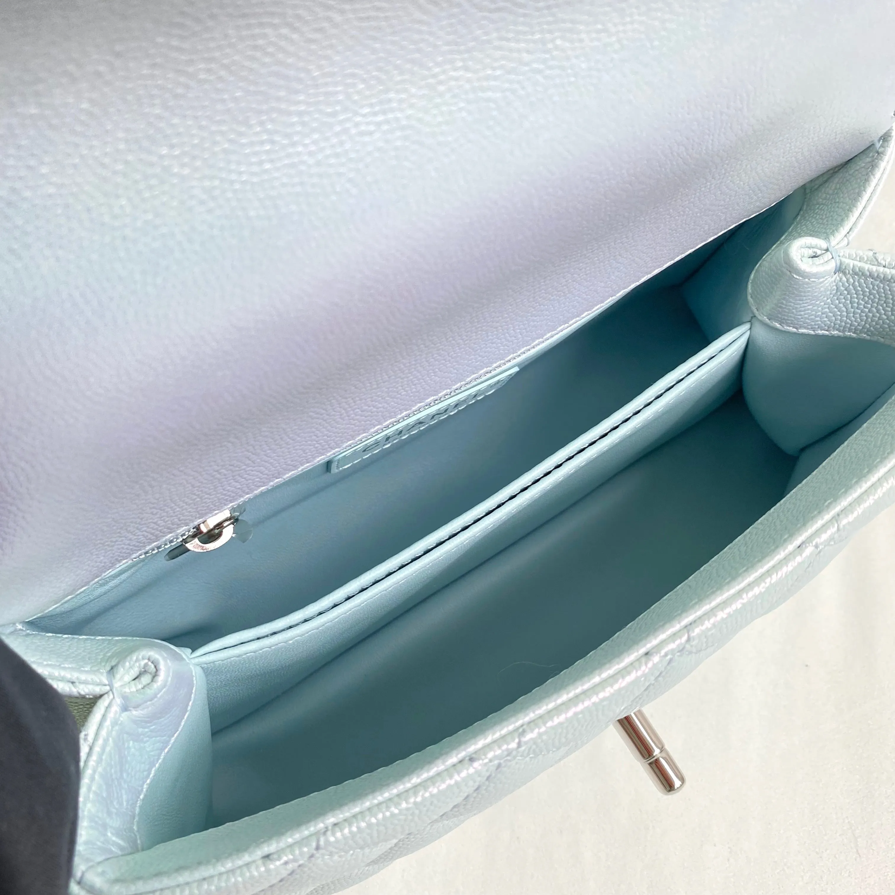 Mini Coco Handle Flap Bag in 21K Iridescent Icy Blue Caviar