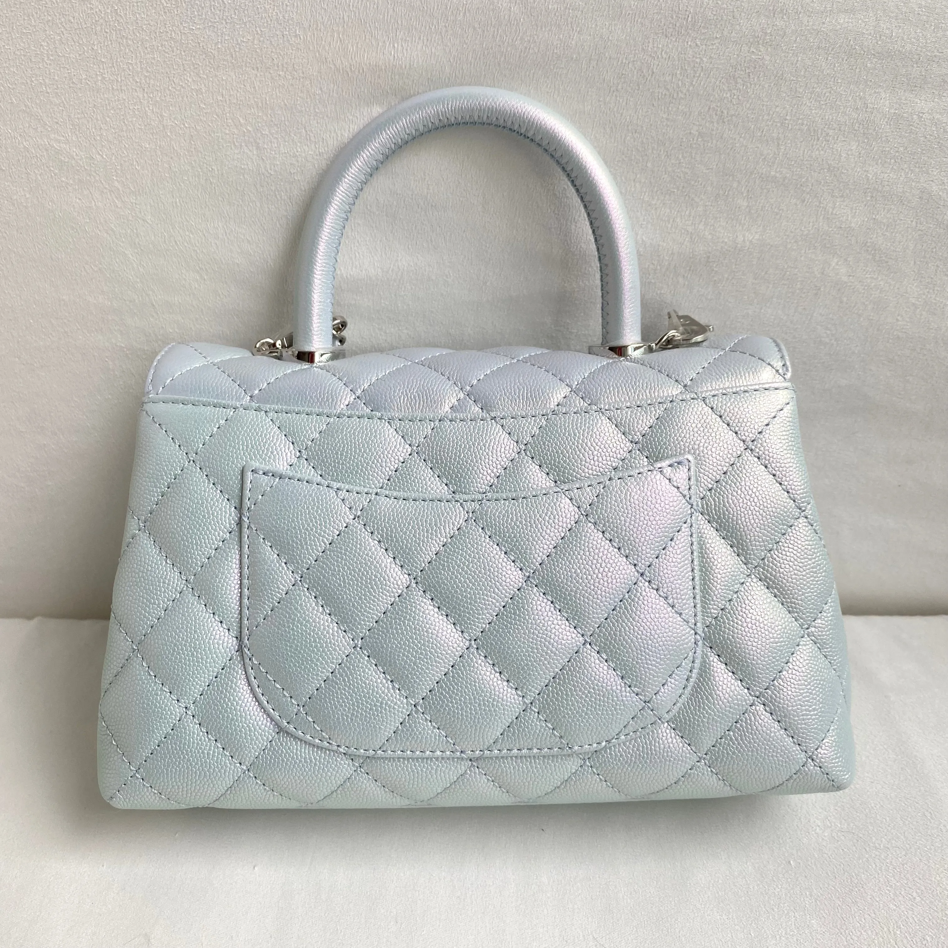 Mini Coco Handle Flap Bag in 21K Iridescent Icy Blue Caviar