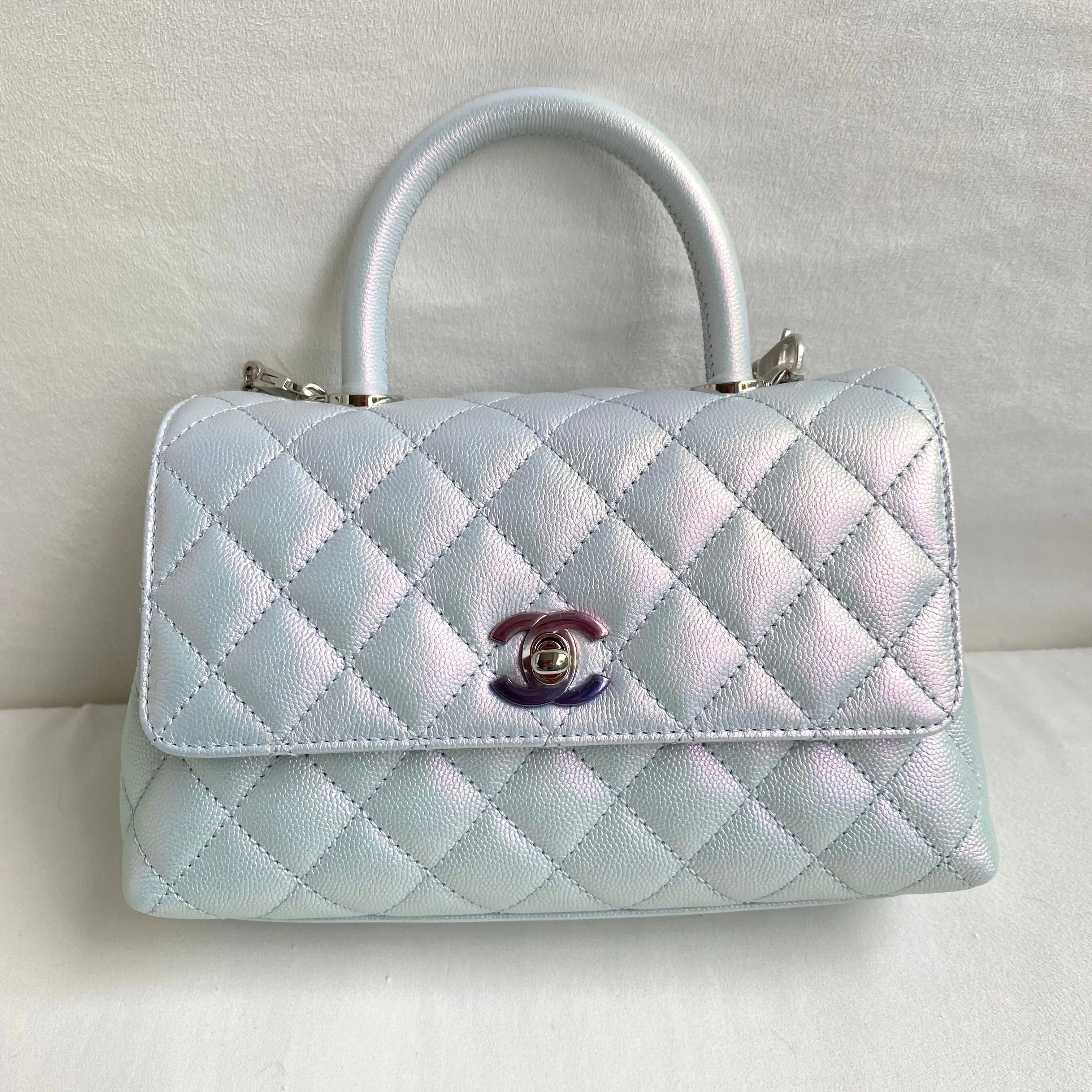 Mini Coco Handle Flap Bag in 21K Iridescent Icy Blue Caviar