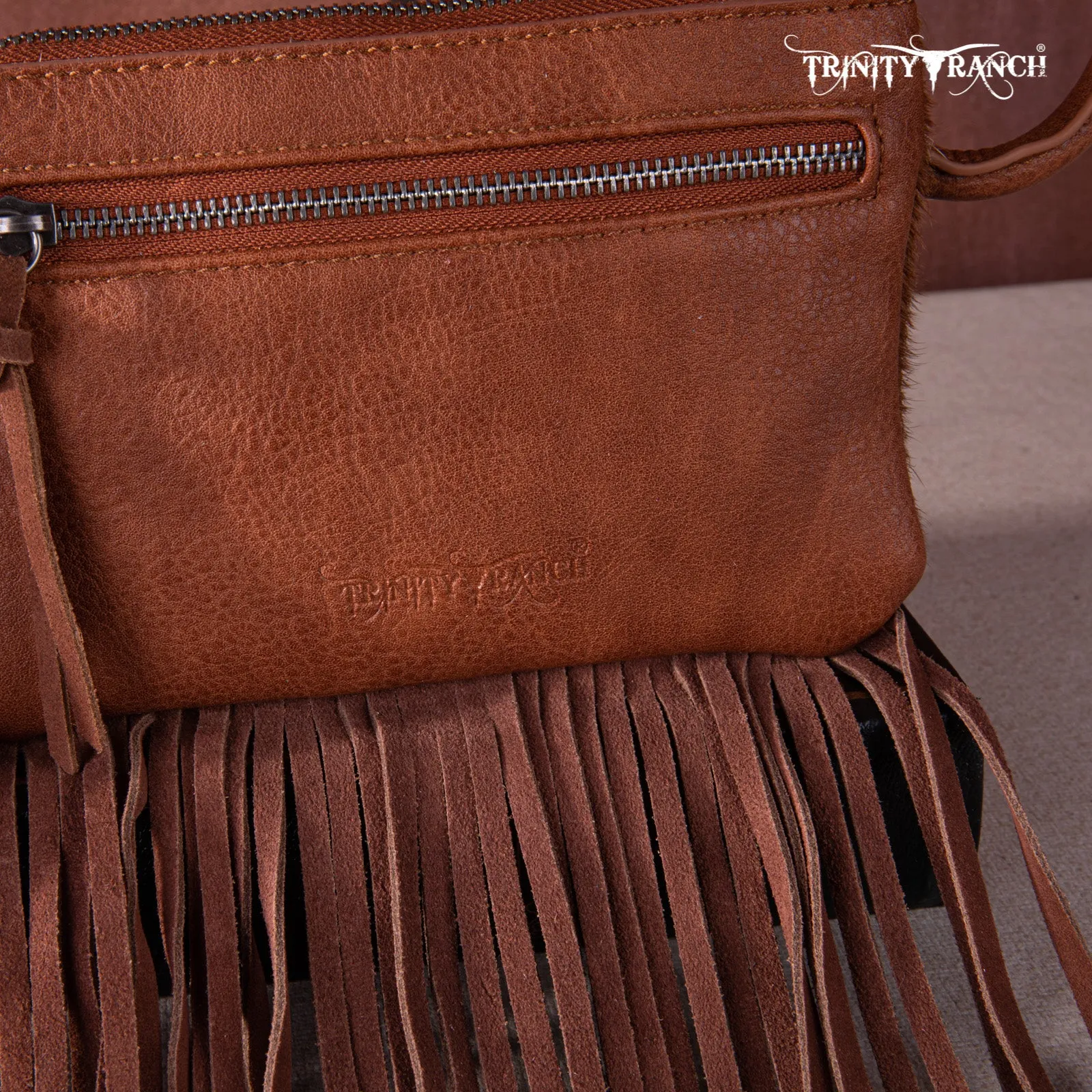 TR167-A181 Trinity Ranch Genuine Hair-On Cowhide Ring Handle Wristlet Clutch Bag - Oak